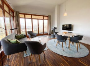 Apartment direkt am See mit Balkon und Kamin - Wiesengeflüster